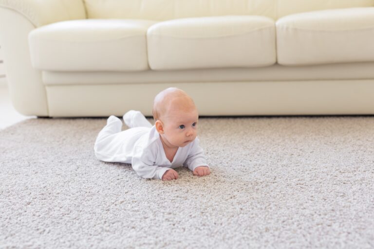 clean carpet with baby crawling